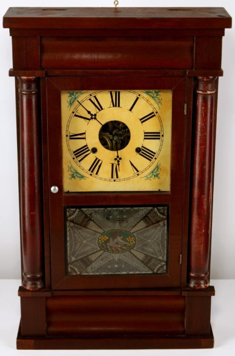 A SETH THOMAS COLUMN AND CORNICE SHELF CLOCK