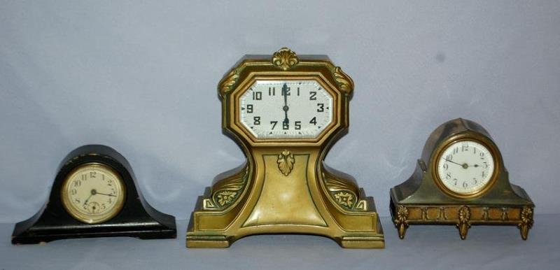 3 Vintage Novelty Desk Clocks. 1.) Cast case with New