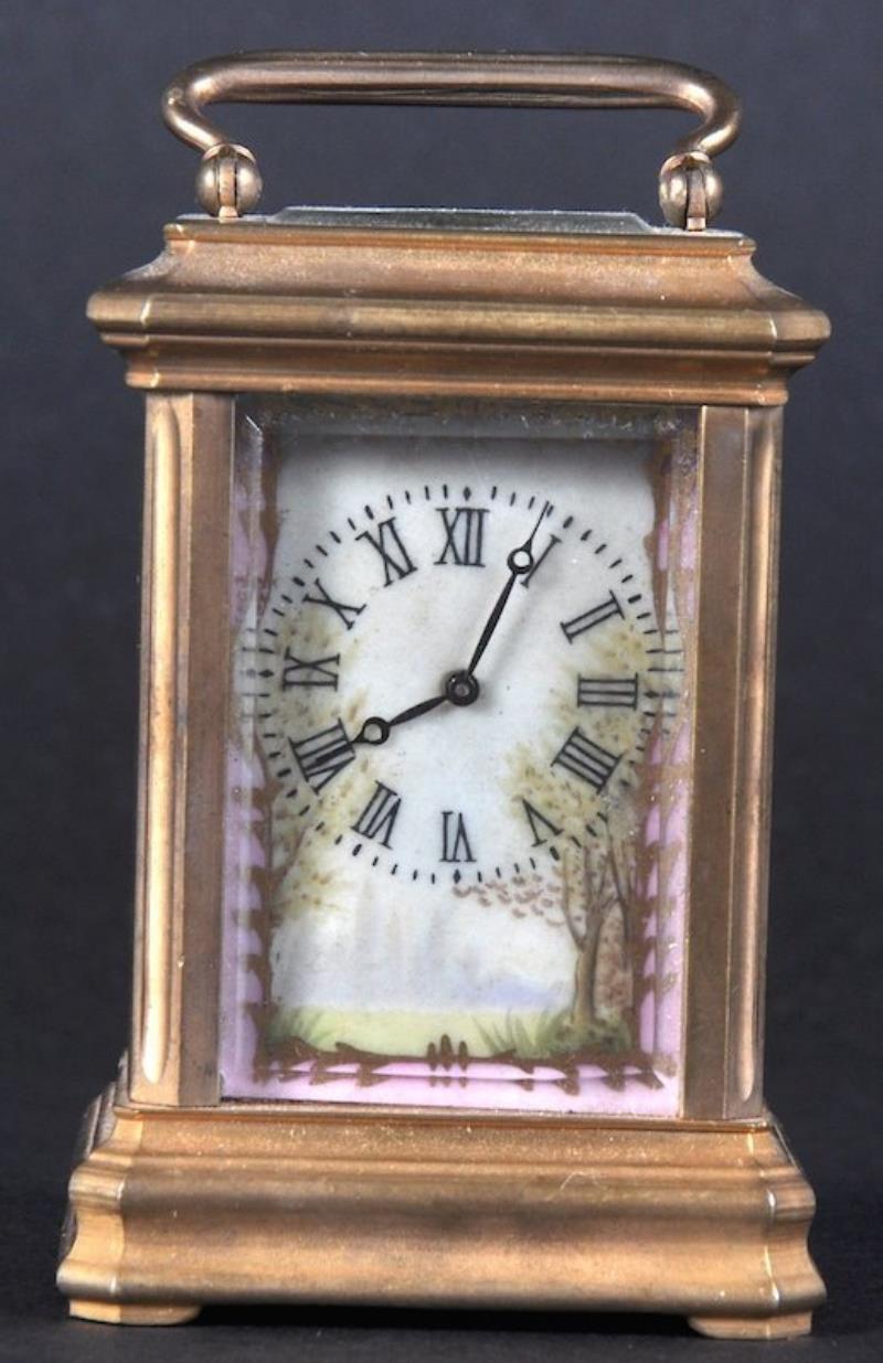 A MINIATURE PINK SEVRES AND BRASS CARRIAGE CLOCK. 3.5