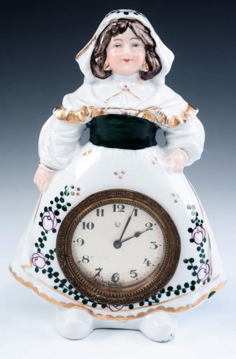 A CIRCA 1900 GERMAN PORCELAIN FIGURAL NOVELTY CLOCK