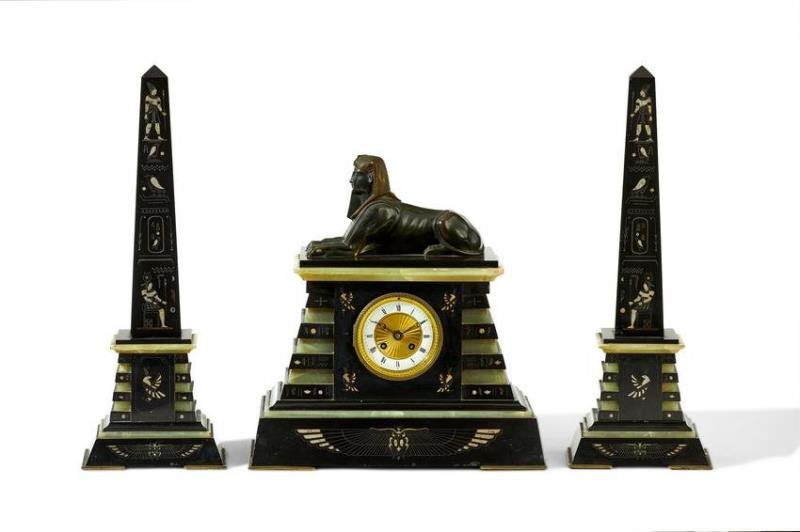 A French Egyptian Revival clock and garniture set