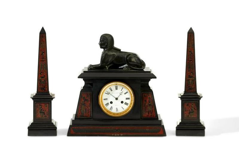 A French Egyptian Revival clock and garniture set