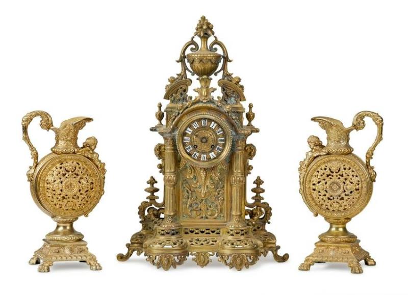 An American brass clock with garniture