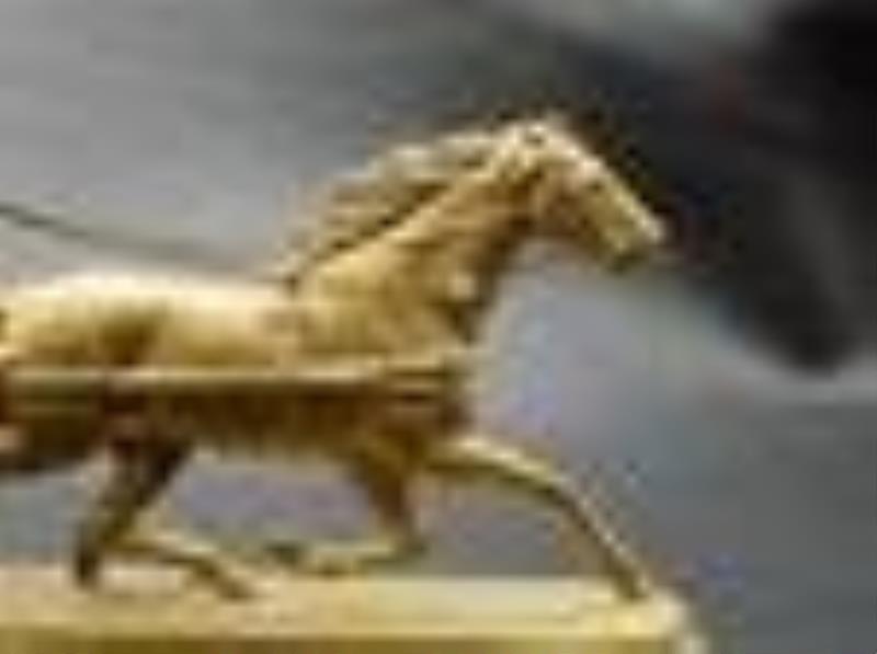 Unusual vintage clock with sulky racing horse