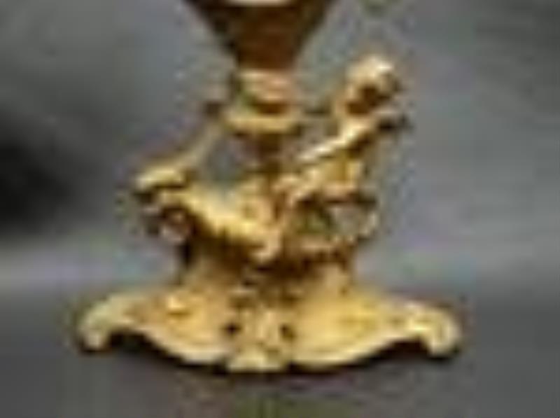 Vintage Art Nouveau clock with cherub. Cherub and flowers
