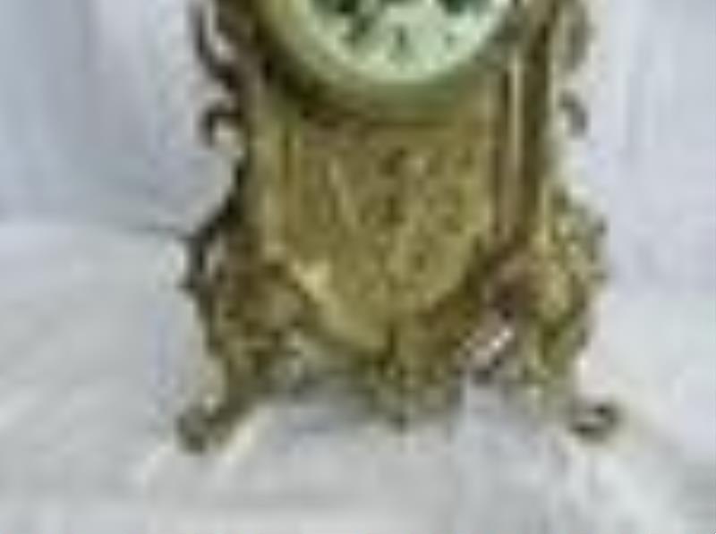 Fancy Victorian French brass clock with cupid