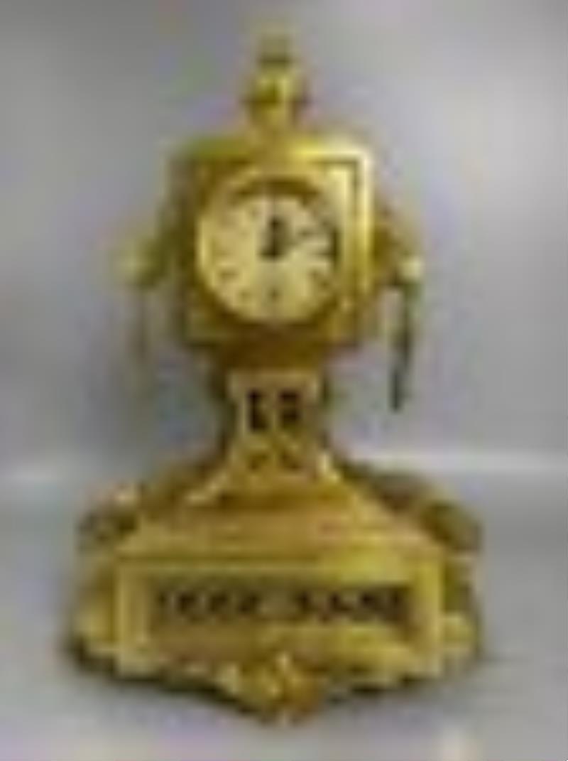 Gilt copper mechanical clock