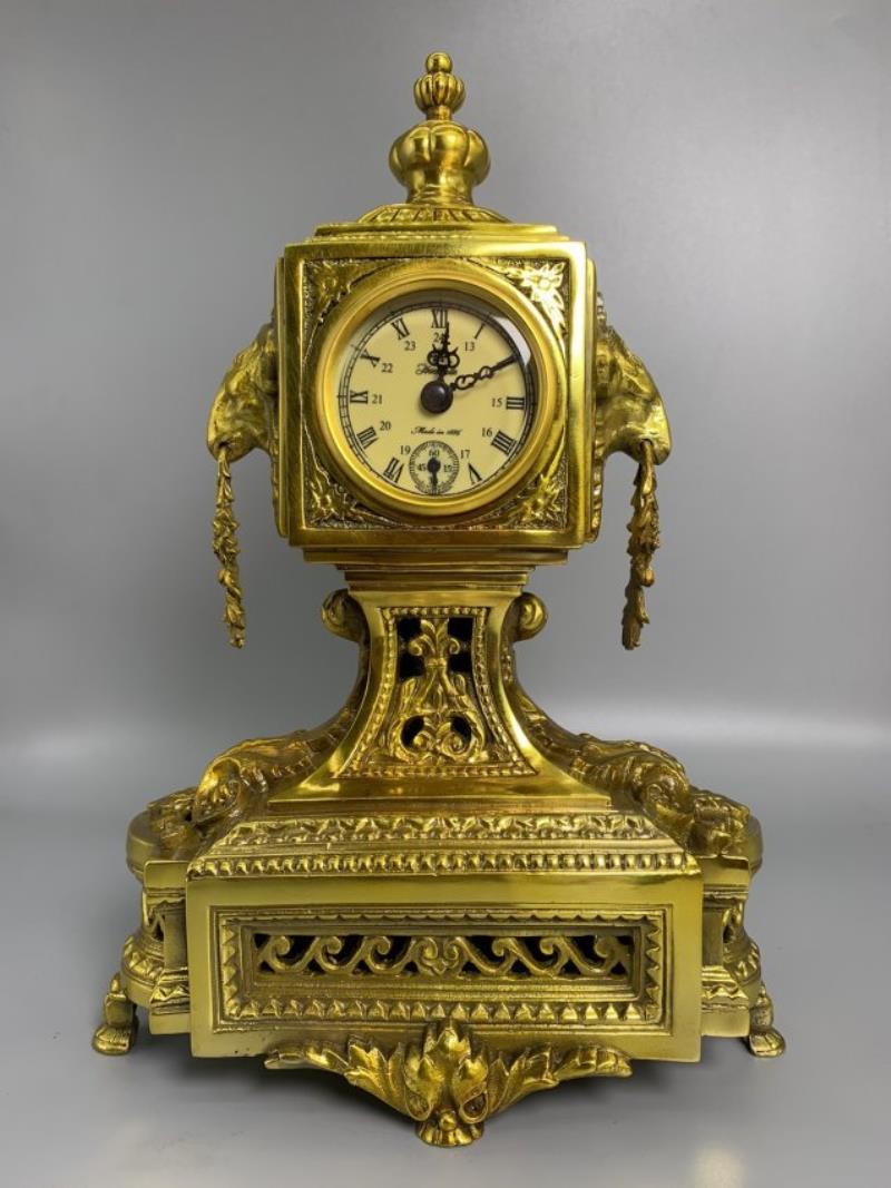 Gilt copper mechanical clock