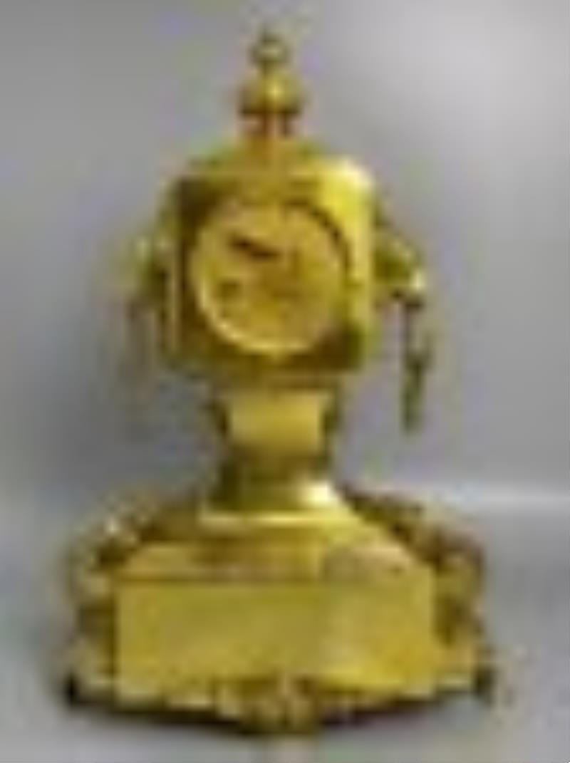 Gilt copper mechanical clock