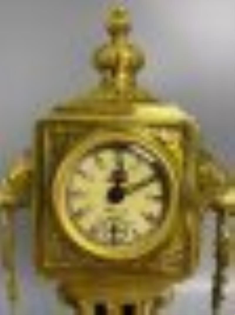 Gilt copper mechanical clock