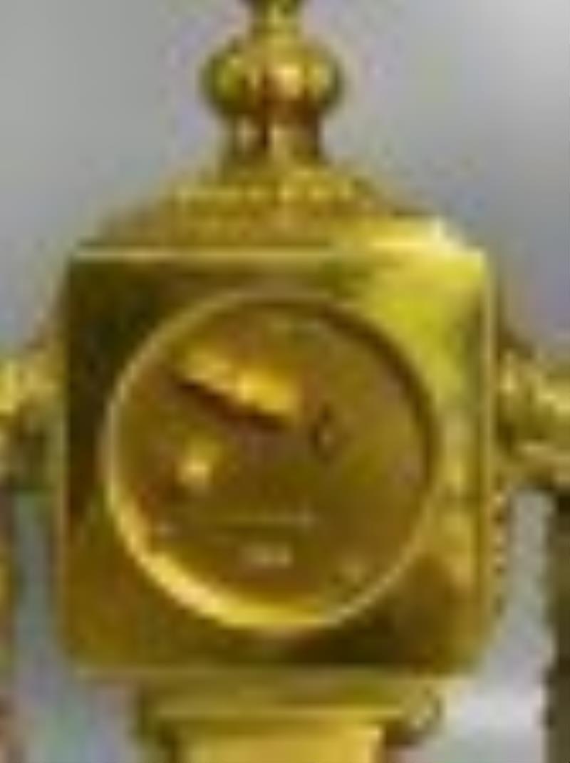 Gilt copper mechanical clock