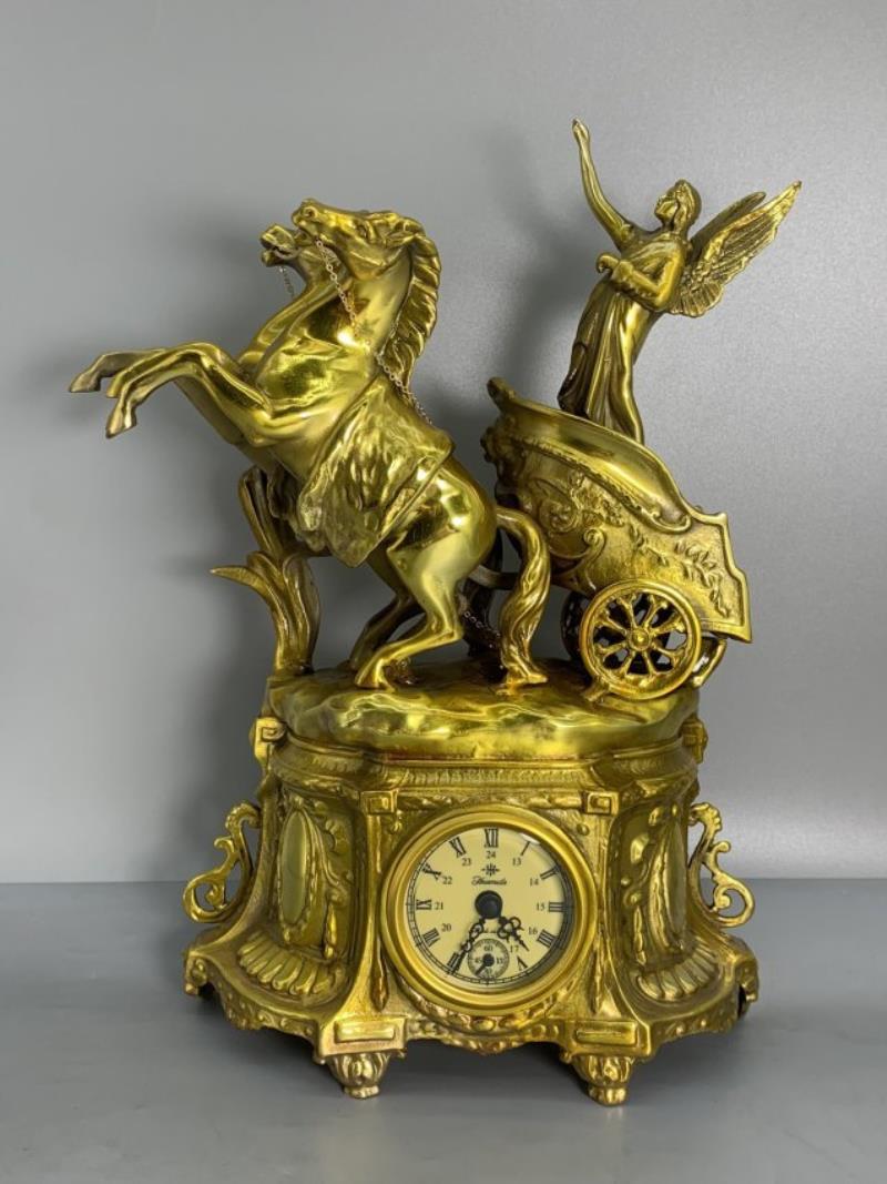 Gilt copper mechanical clock