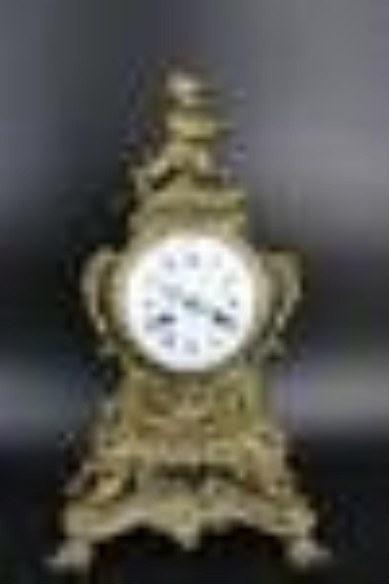 Tiffany Signed Bronze Clock With Cherub Finial.