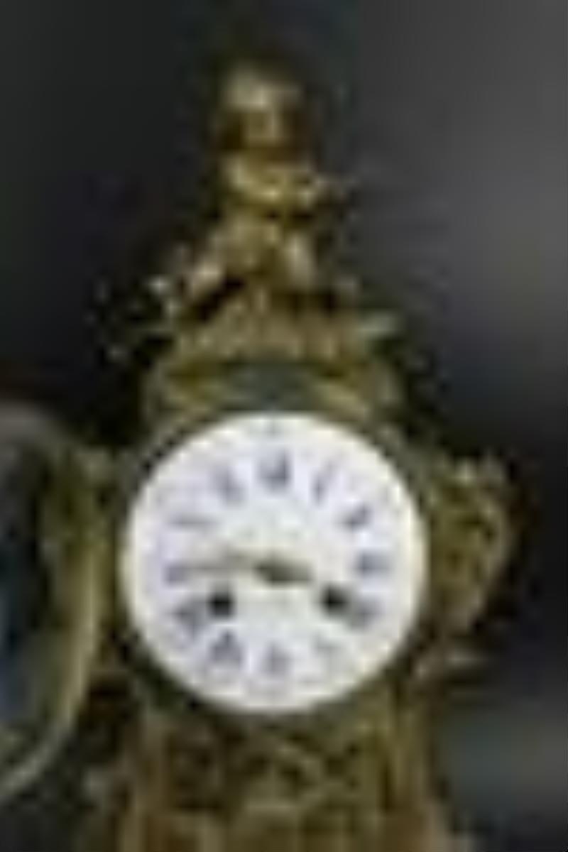Tiffany Signed Bronze Clock With Cherub Finial.