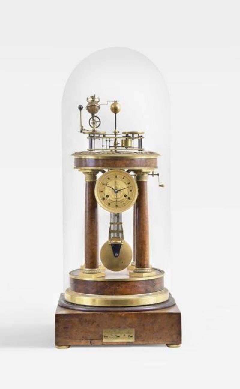 A rare amboyna and gilt bronze orrery clock with music box signed Raingo Freres