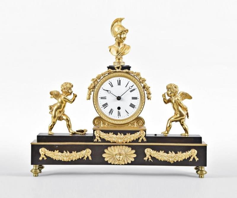 An English gilt and patinated bronze mantel clock signed Baetens London