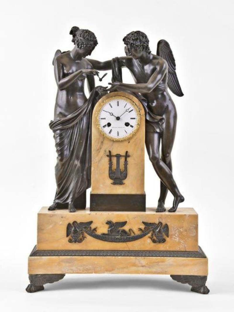 A good mid 19th century figural mantel clock featuring Cupid and Psyche