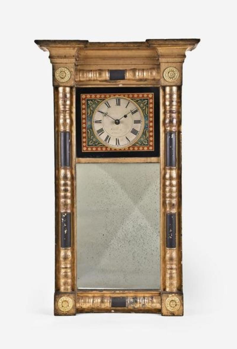 A 19th century New Hampshire mirror clock by James Cary Brunswick Maine