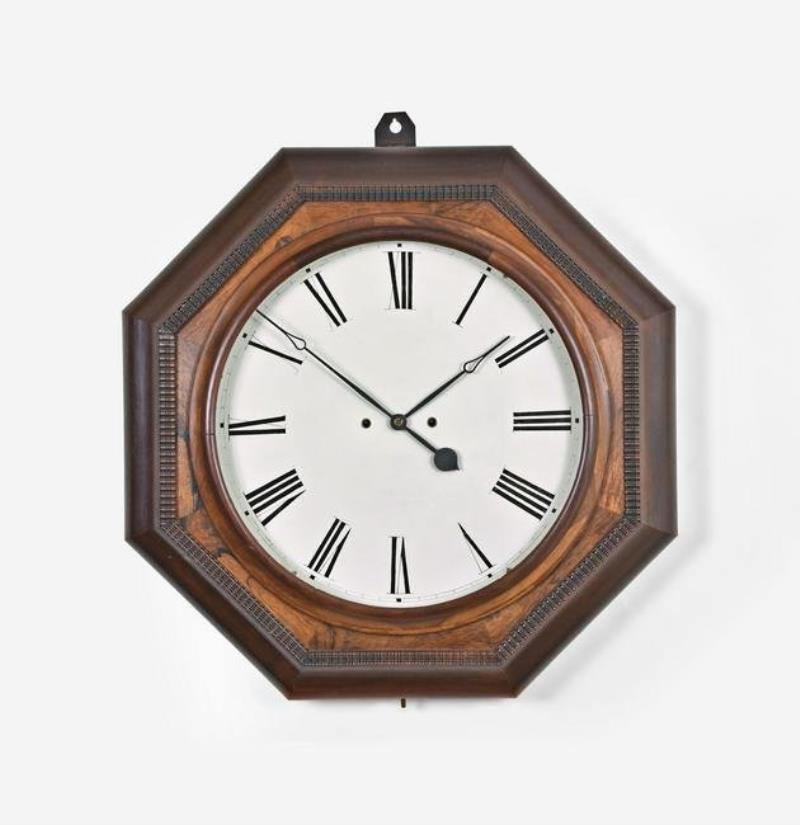 Atkins, Whiting & Co., ogee octagon wall clock with wagon spring movement.