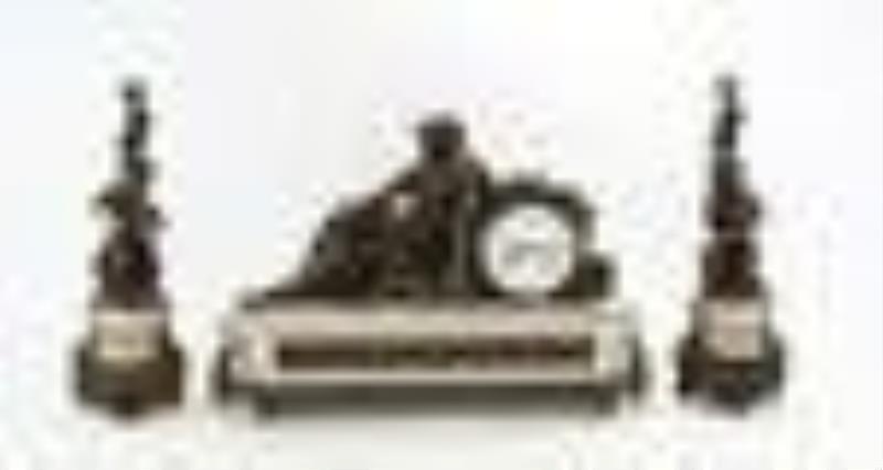 Charpentier and Co. Gilt and Patinated Bronze Mounted Mantel Clock