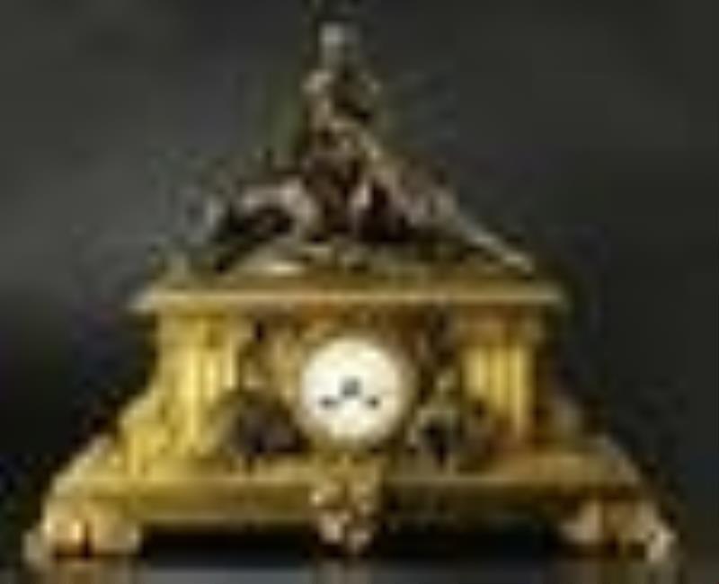 Beautiful dark patina man on horse on top of Dore bronze clock