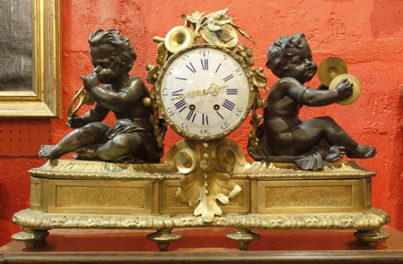 Early 19th C Large Dore Bronze & Dark Patina Clock with Cupids Playing Musical Instruments