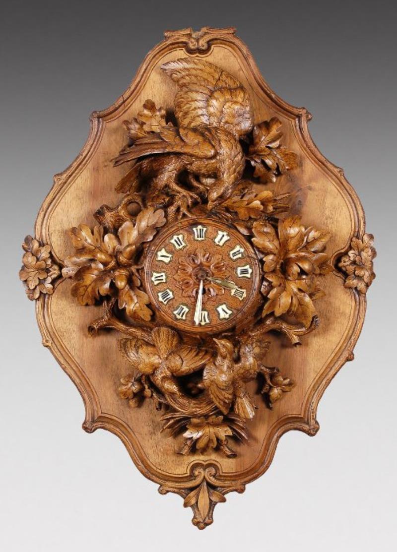 Swiss Black Forrest Style carved oak wall clock