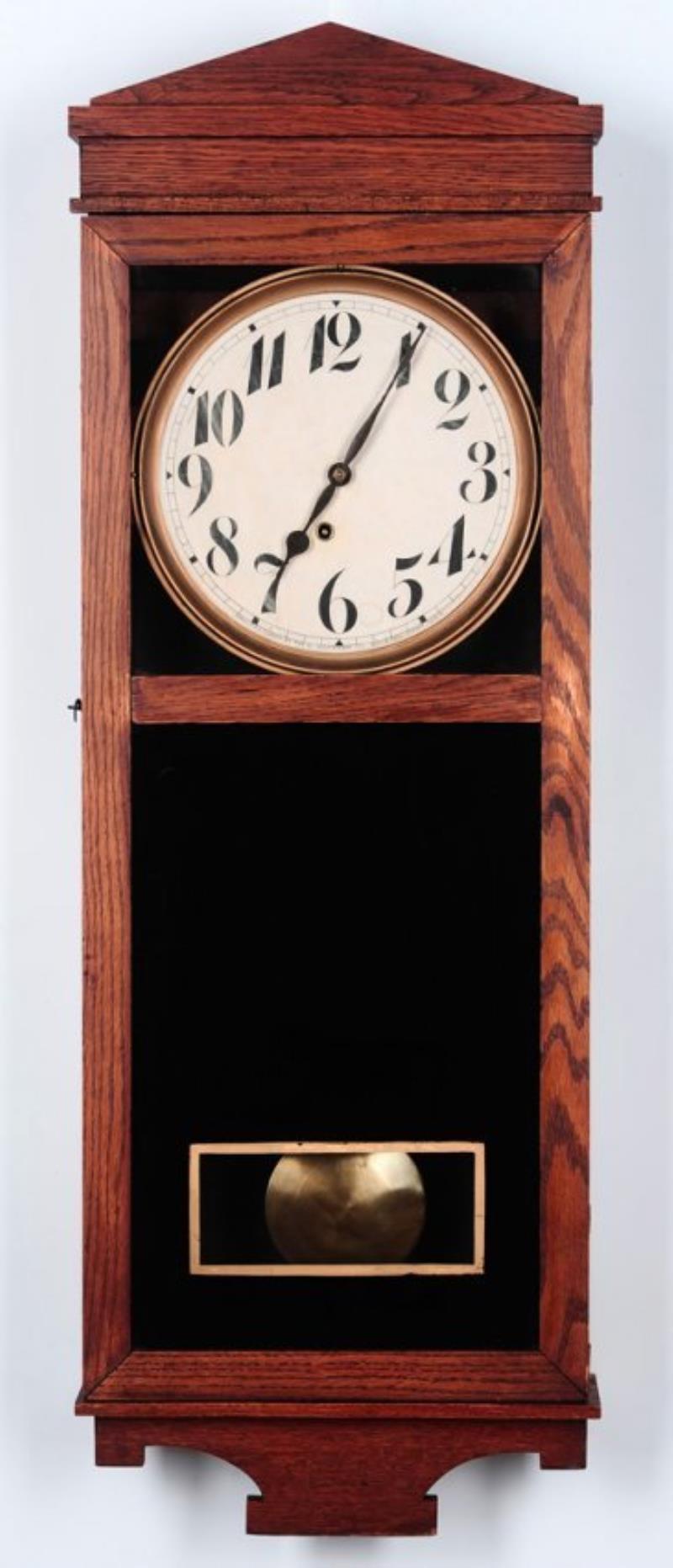 AN INGRAHAM OAK BOX REGULATOR WALL CLOCK