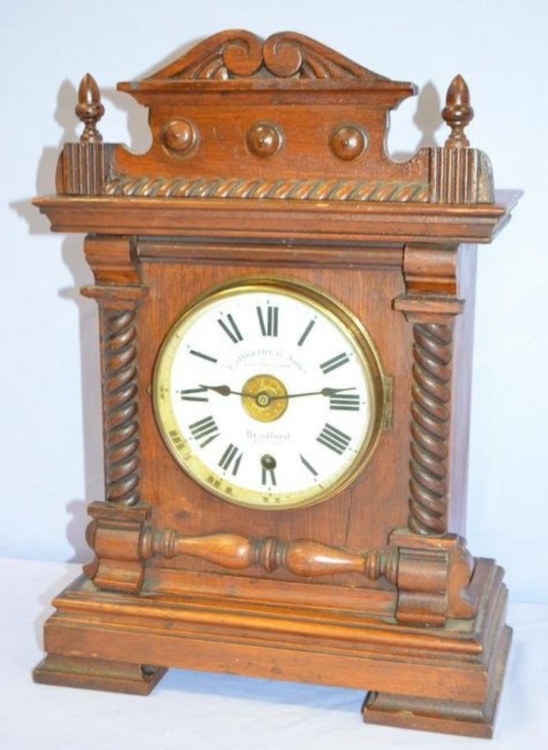 Fattorini & Sons Wood Bell Alarm Clock. T/O, signed
