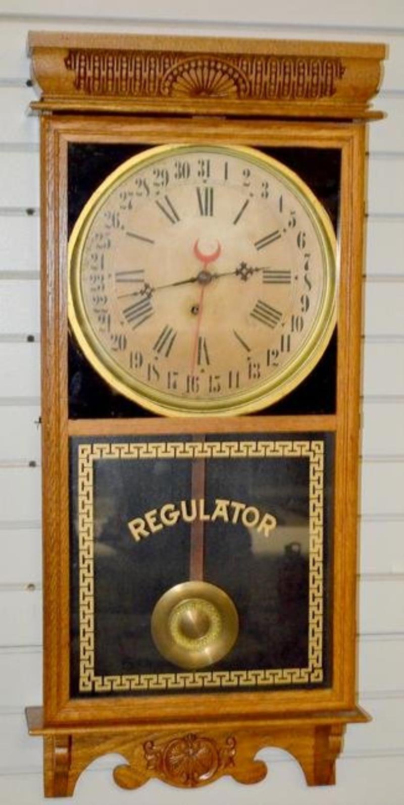 Antique Ingraham Calendar Regulator Clock. Oak case,