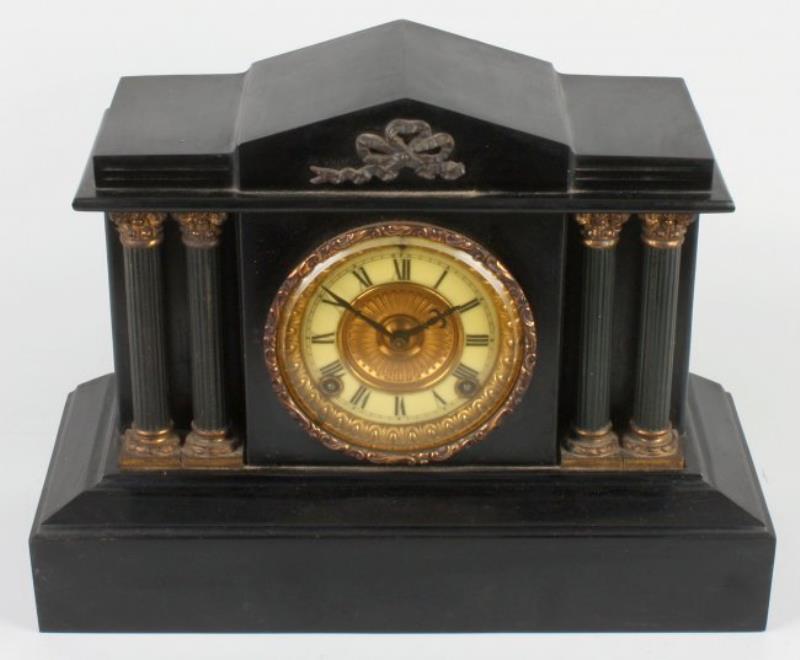 Two black slate mantel clocks