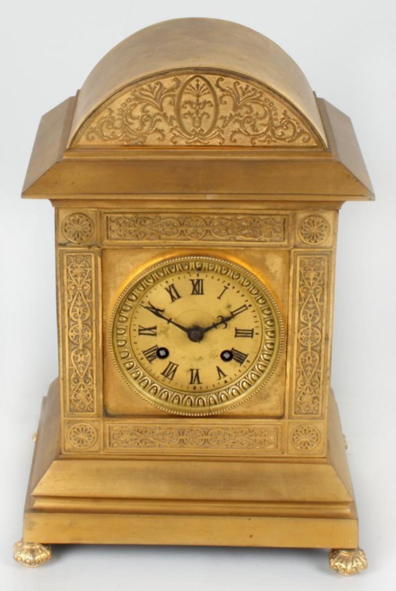 A late 19th century French brass mantel clock