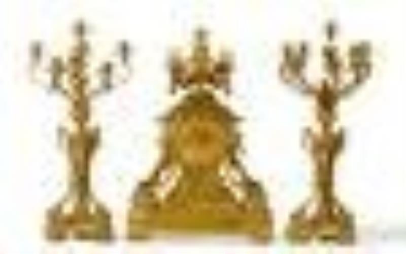 A French Louis XV-style clock and garniture set