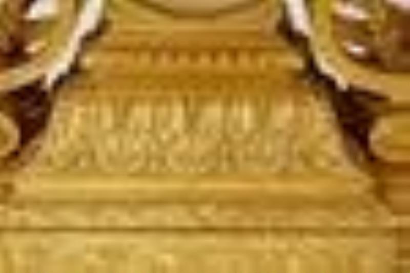A French Louis XV-style clock and garniture set