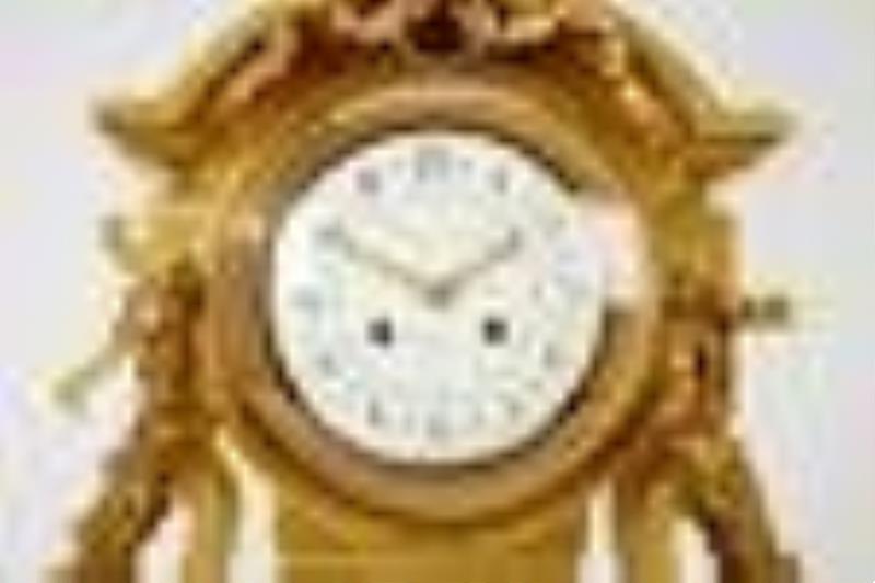 A French Louis XV-style clock and garniture set