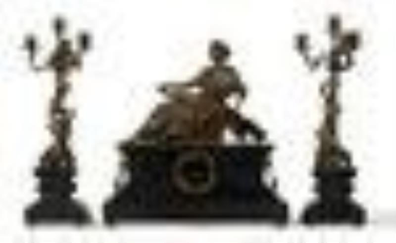 A Victorian-style mantel clock and garniture set