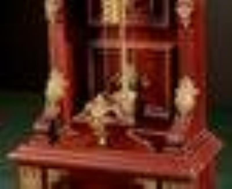 An Ansonia tall case clock