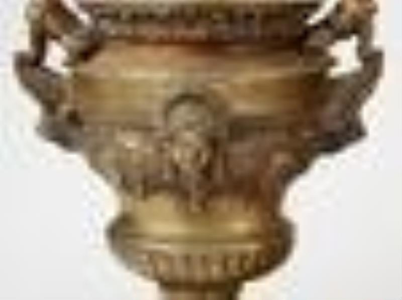 A Greco-Roman Revival clock and garniture set