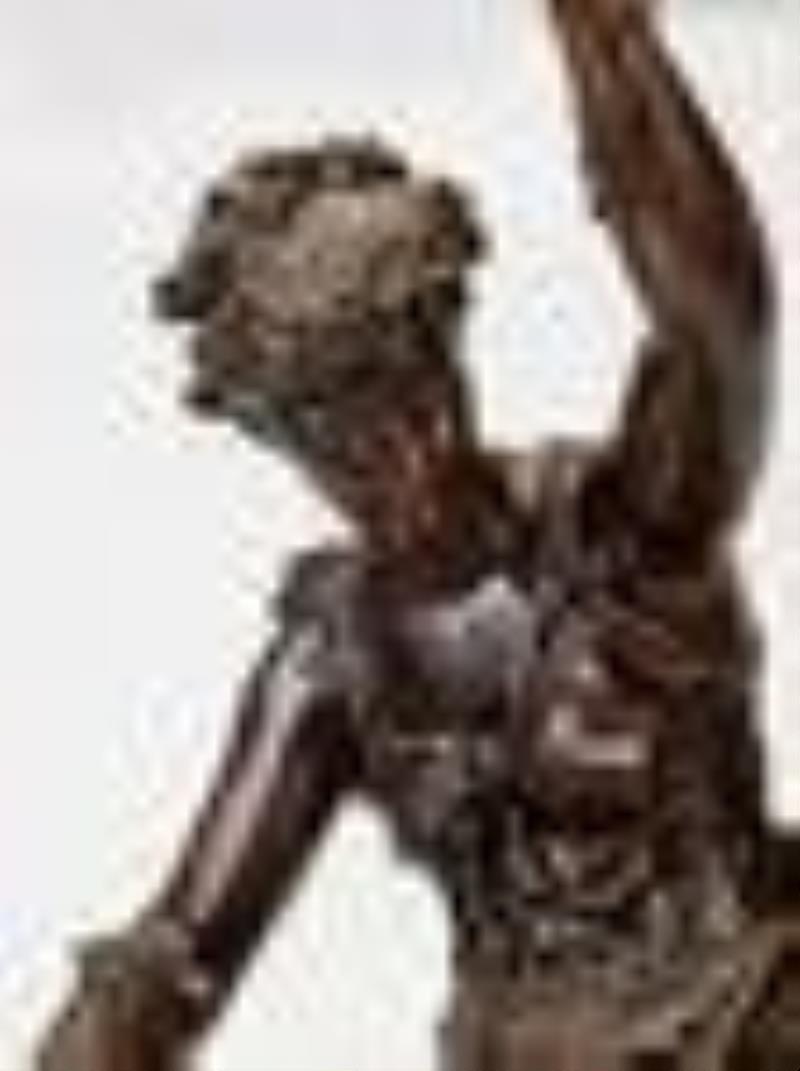 A French bronze and rouge marble figural clock