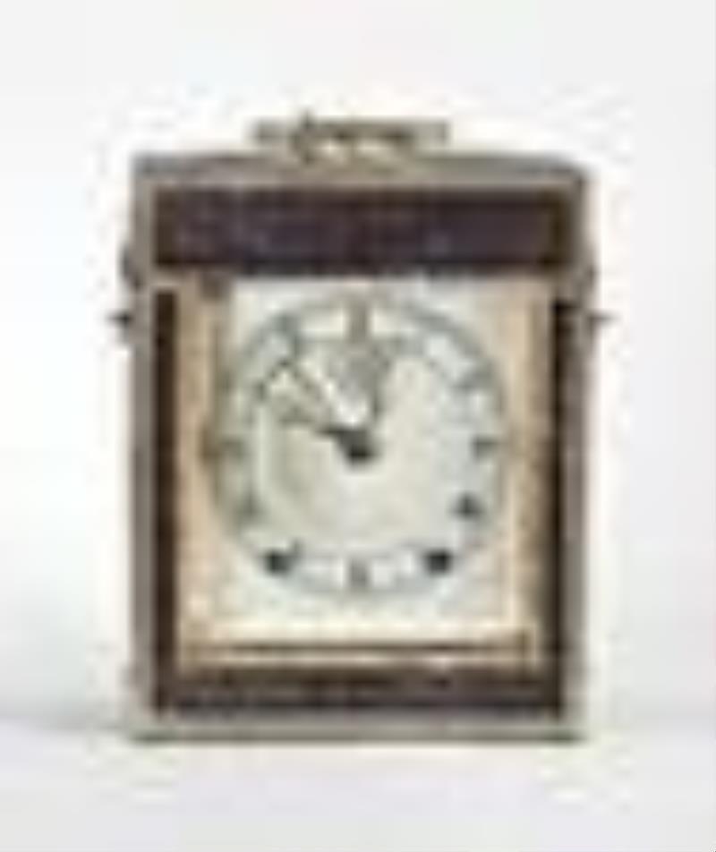 A good French carriage clock with chronometer escapement signed Comminges Paris