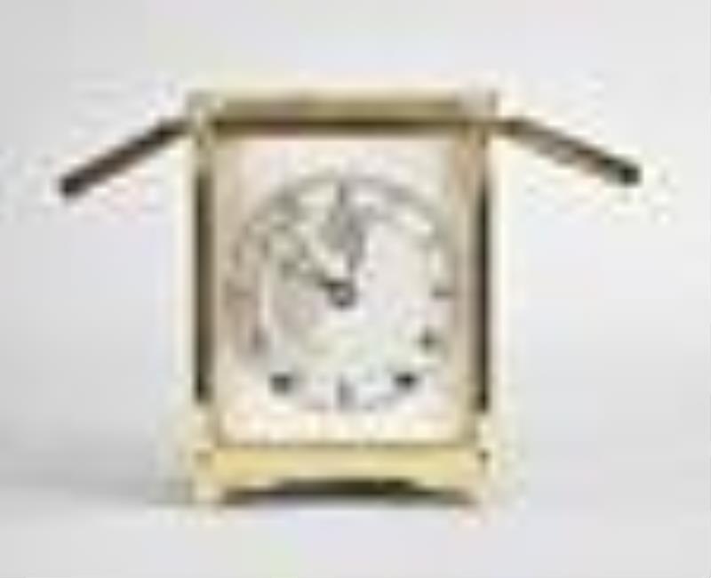 A good French carriage clock with chronometer escapement signed Comminges Paris