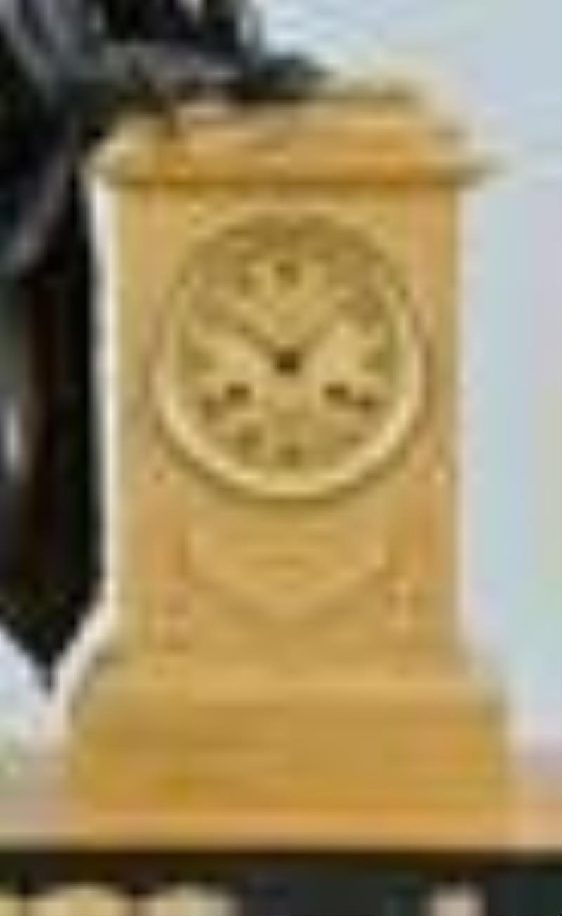 A good French Empire gilt and patinated bronze figural mantel clock signed Lebaury a Paris