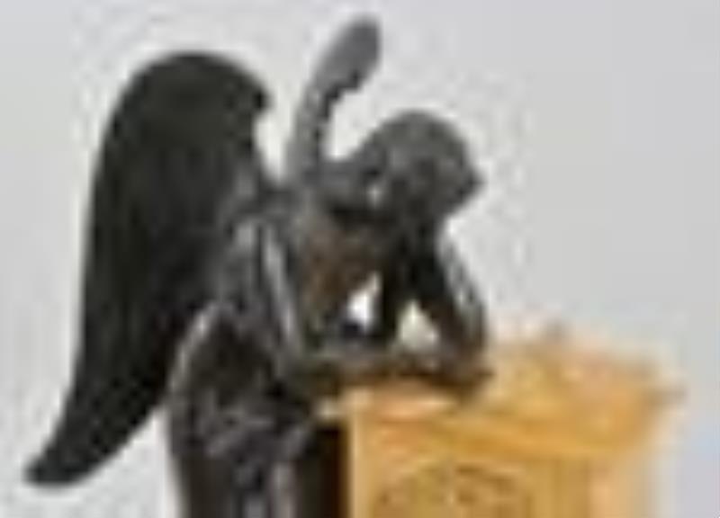 A good French Empire gilt and patinated bronze figural mantel clock signed Lebaury a Paris