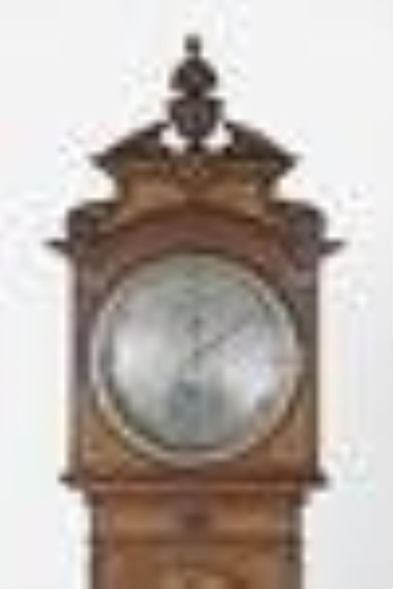 A good 19th century walnut standing astronomical clock by George Jones