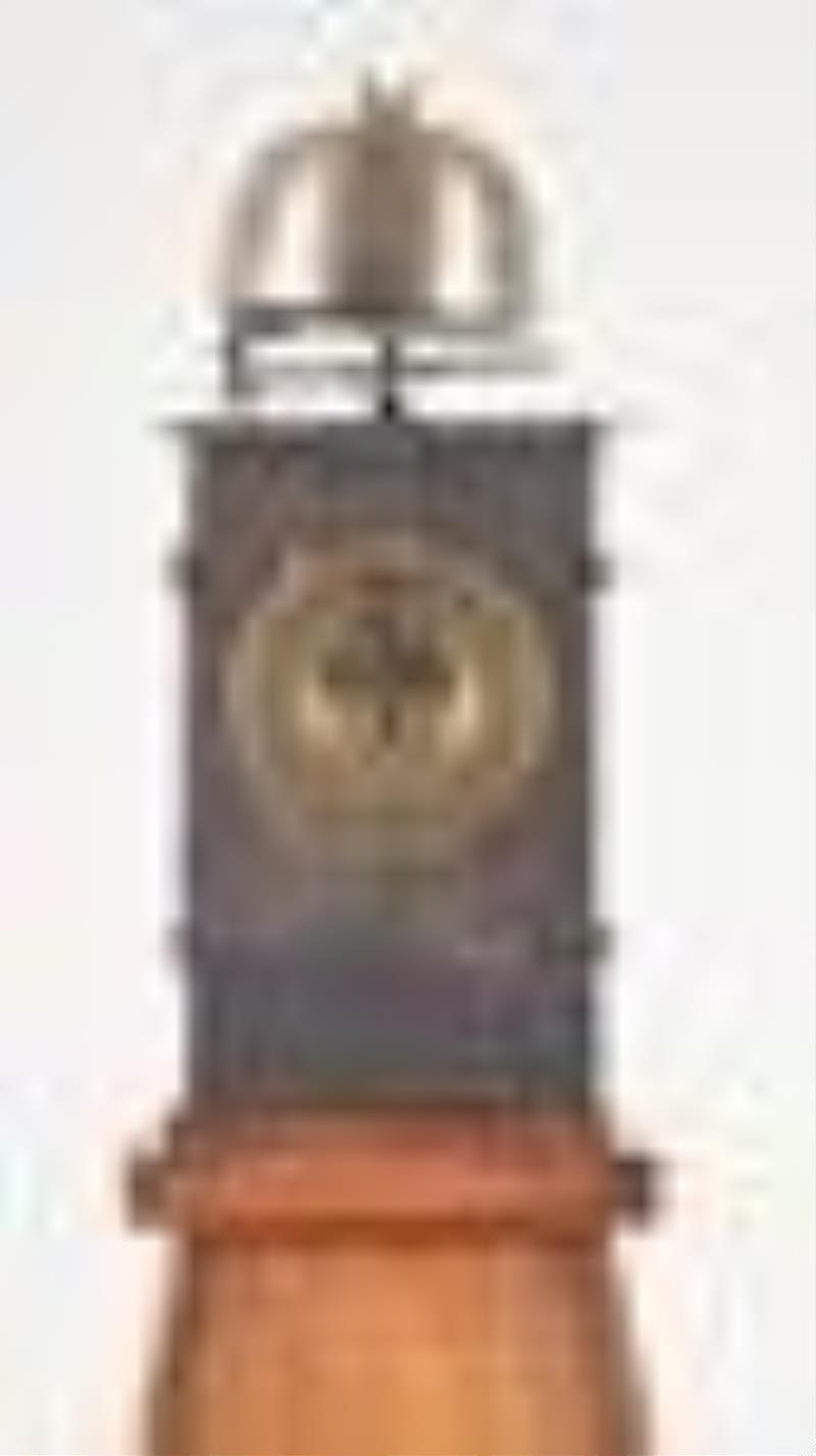 A Japanese 19th century iron lantern clock with wooden stand