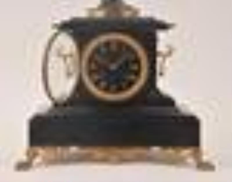 A late 19th century swinging mystery clock by Guilmet with crank and stirrup escapement