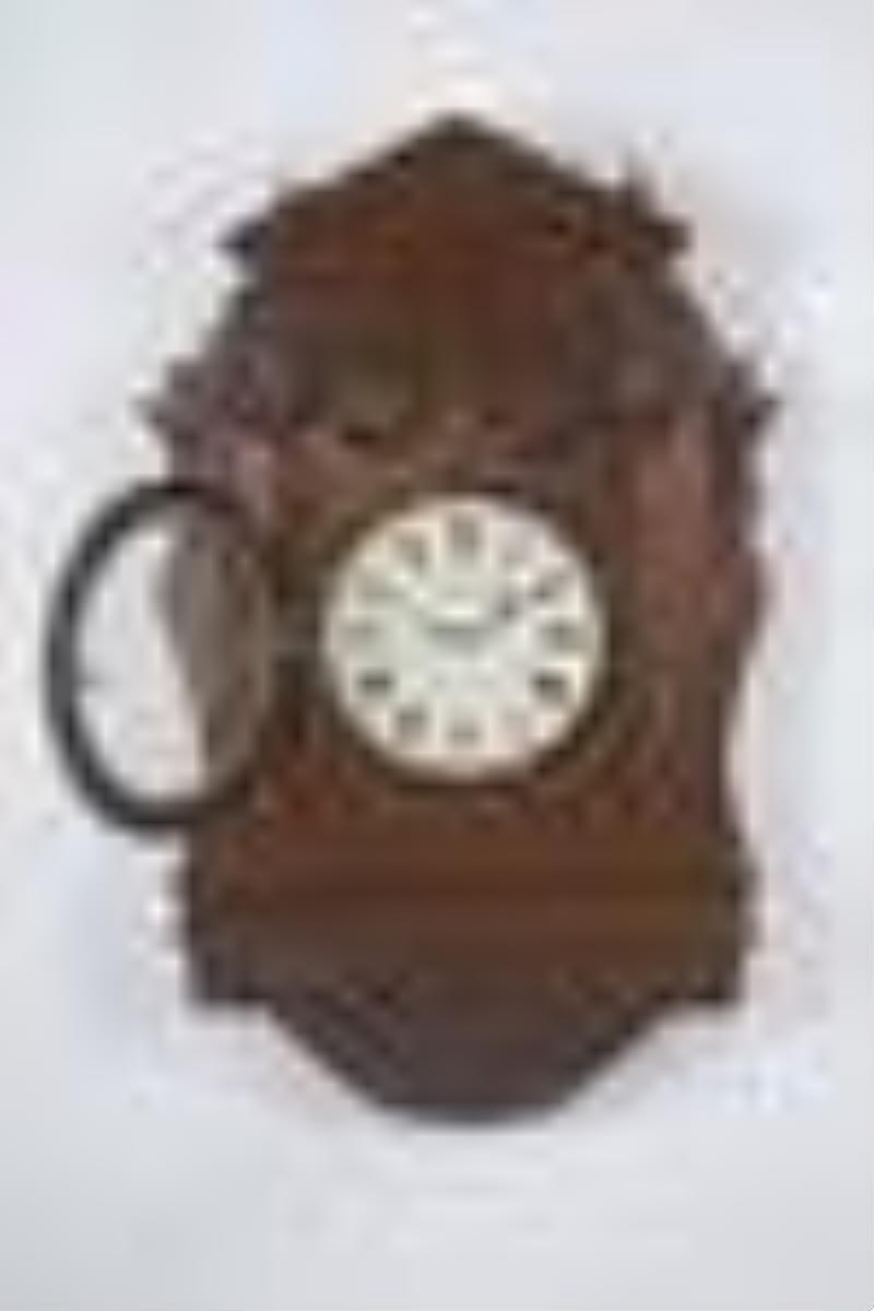 A monumental carved mahogany gallery clock signed Hamilton & Inches Edinburgh