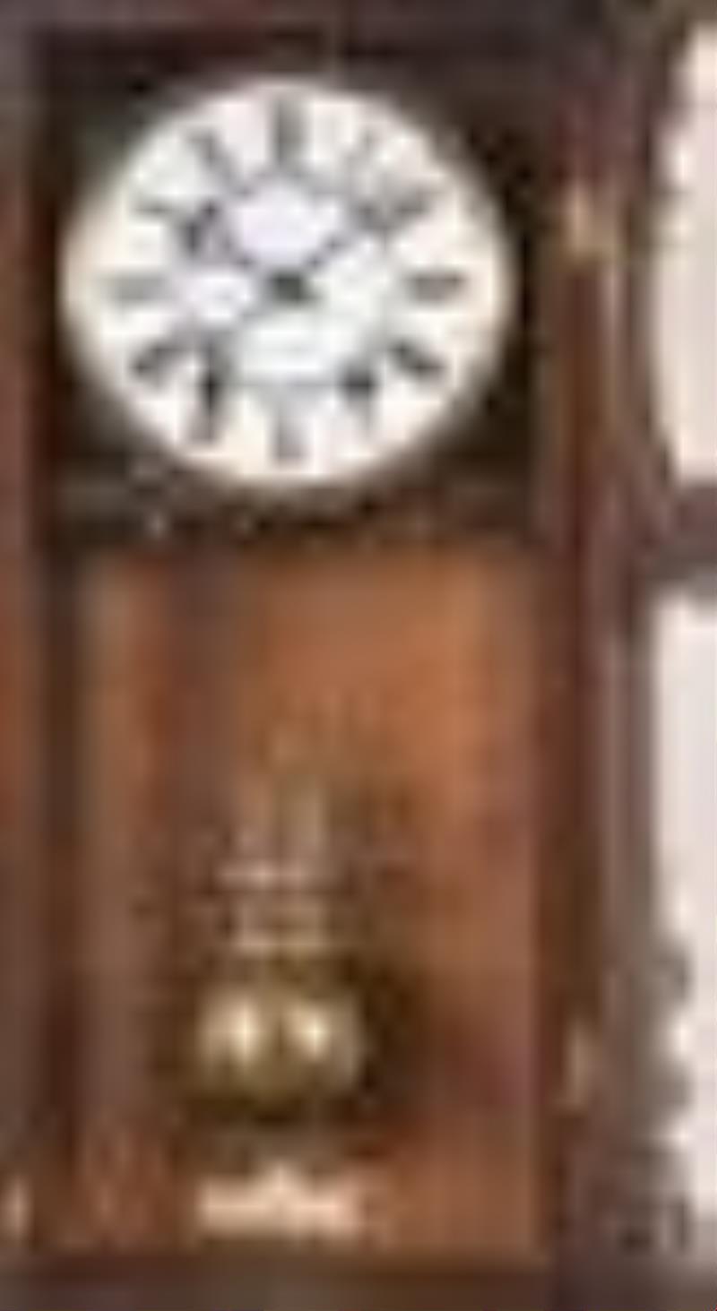 A rare hanging 400 day clock with detent escapement by R. Schnekenburger