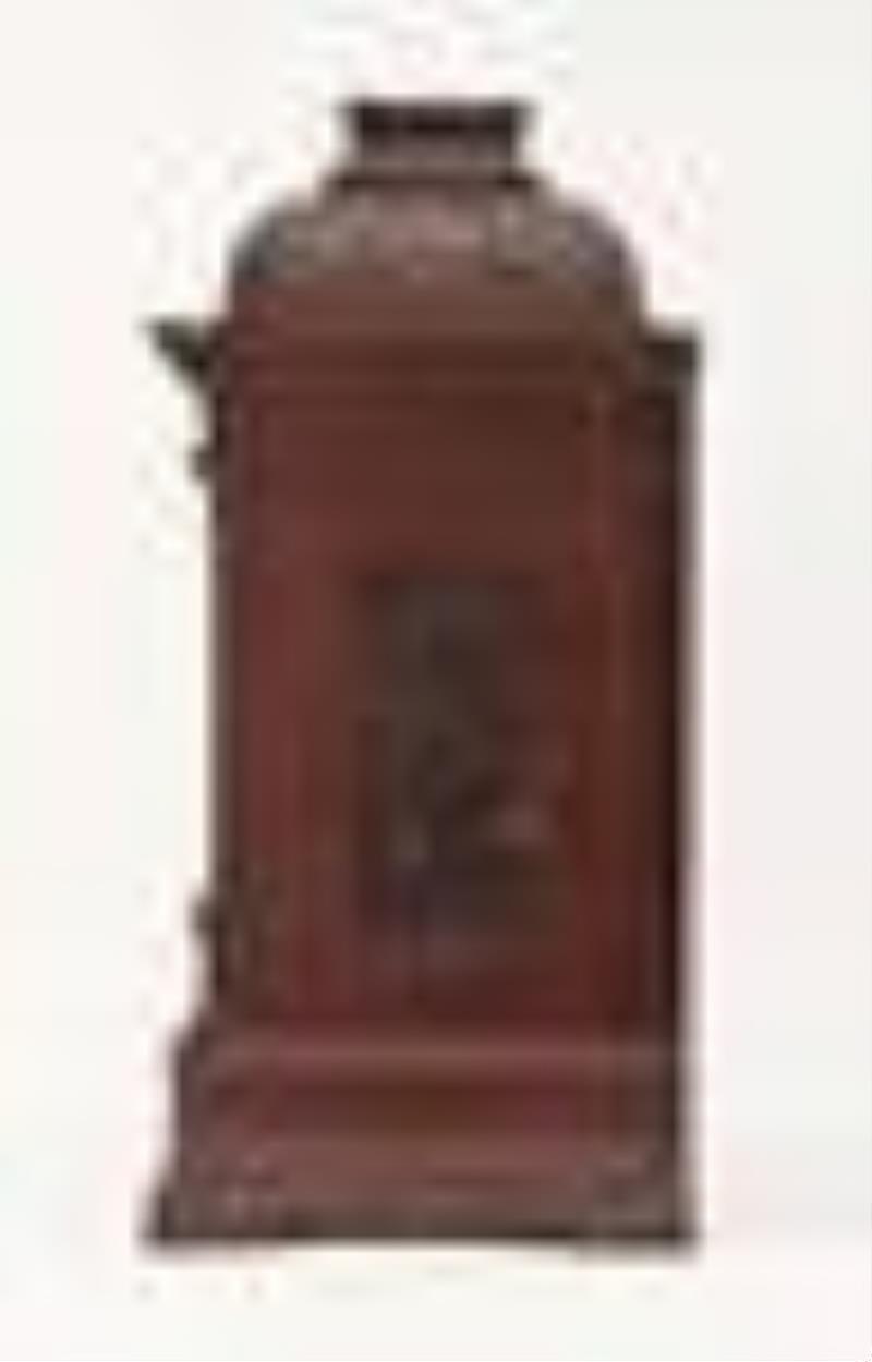 A large mahogany bracket clock chiming on gongs and bells by Elliott