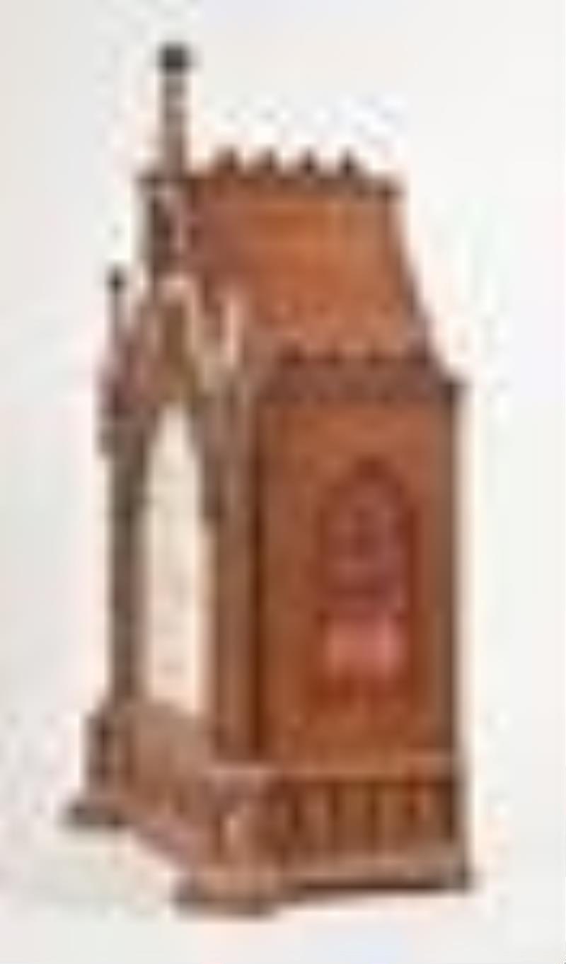 A late 19th century English Gothic style bracket clock chiming on eight bells